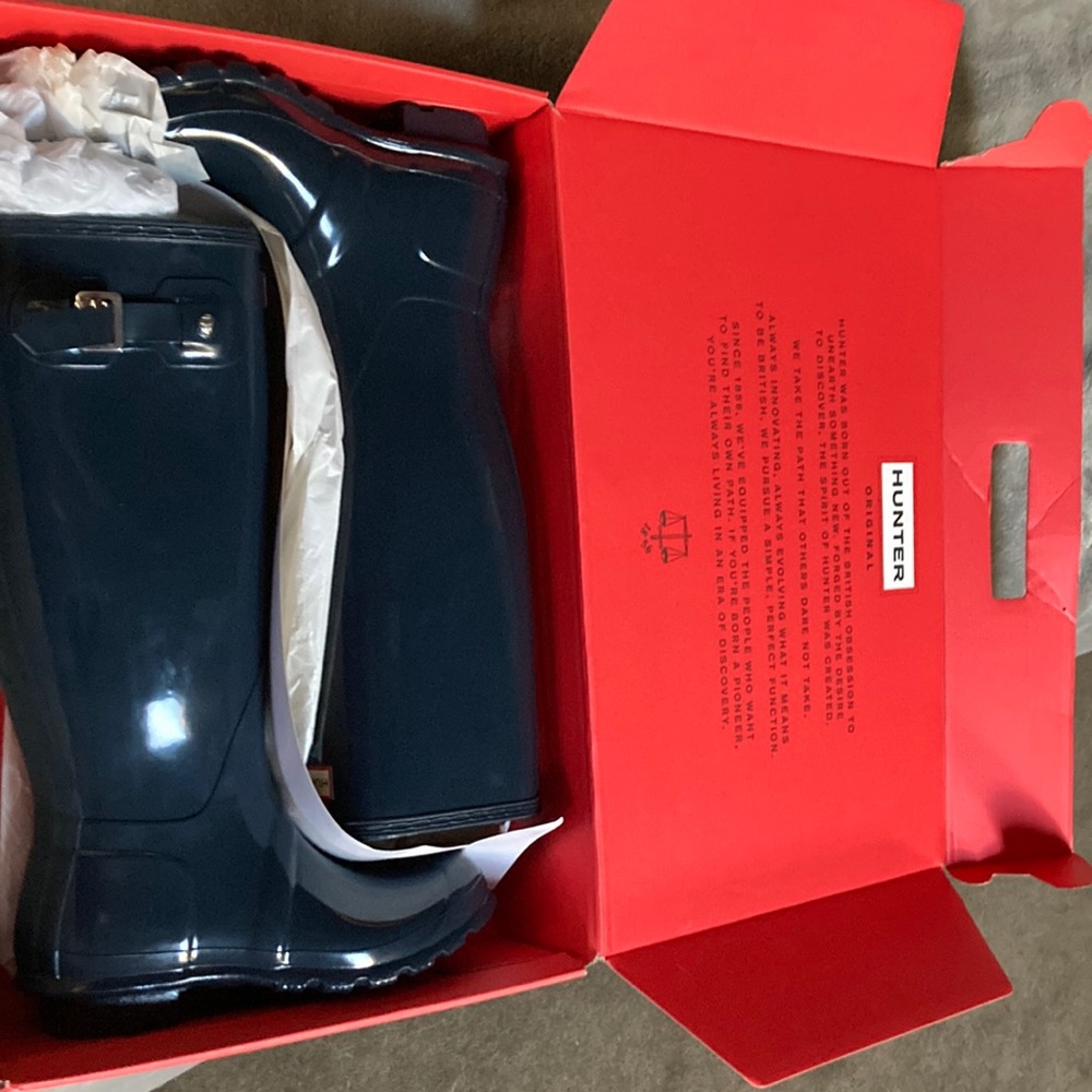 New in box Navy Blue tall hunter boots.  Size 7M